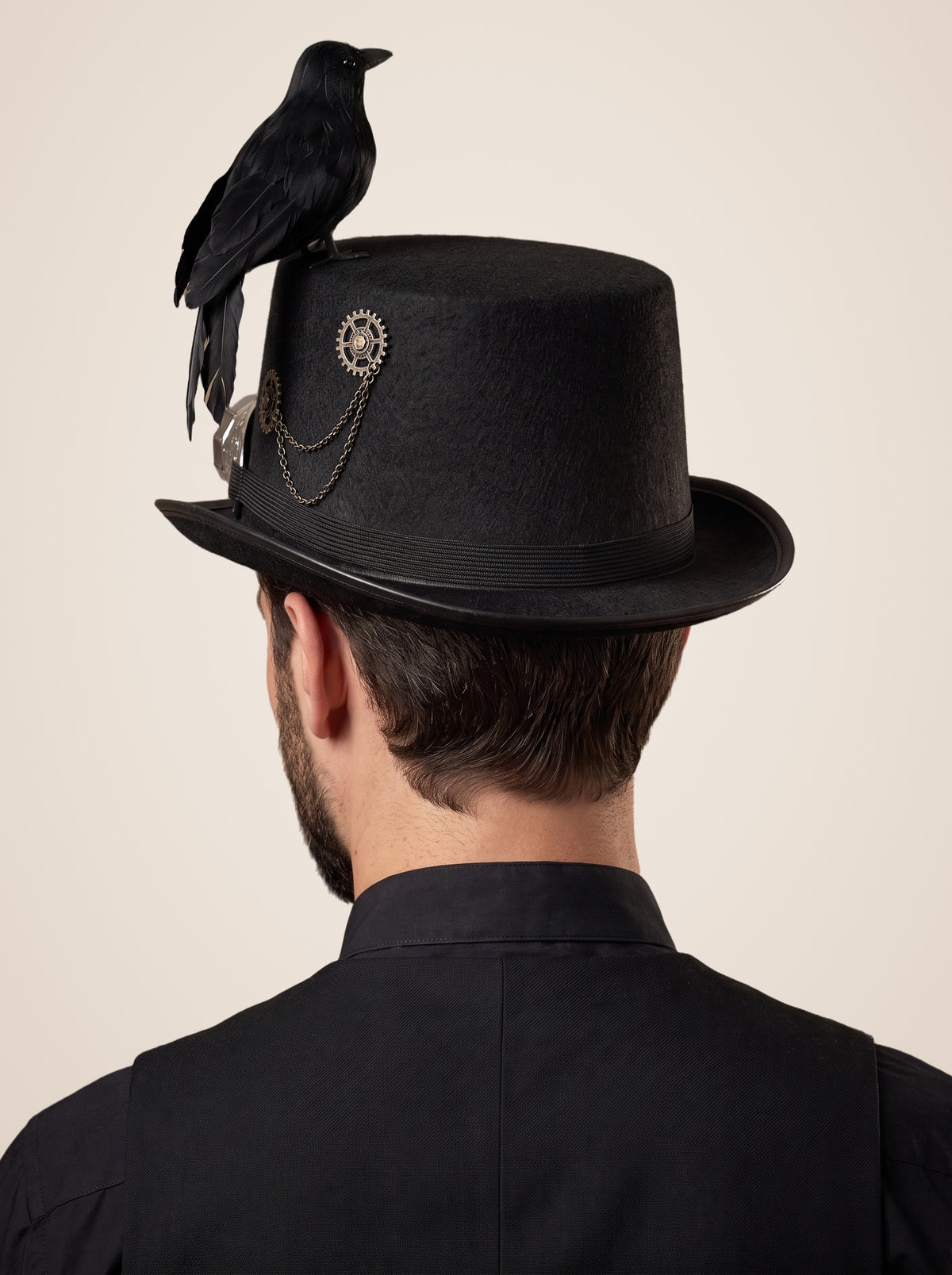 Perched Raven Silver Goggle Top Hat in Black, worn by a model, back view