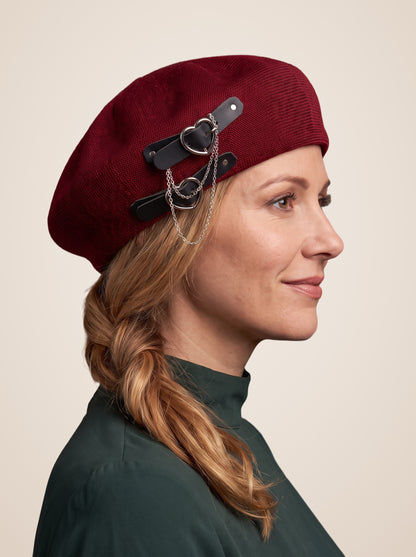 Double Heart Buckle Chain Beret in Wine Red, worn by a model, three quarter view