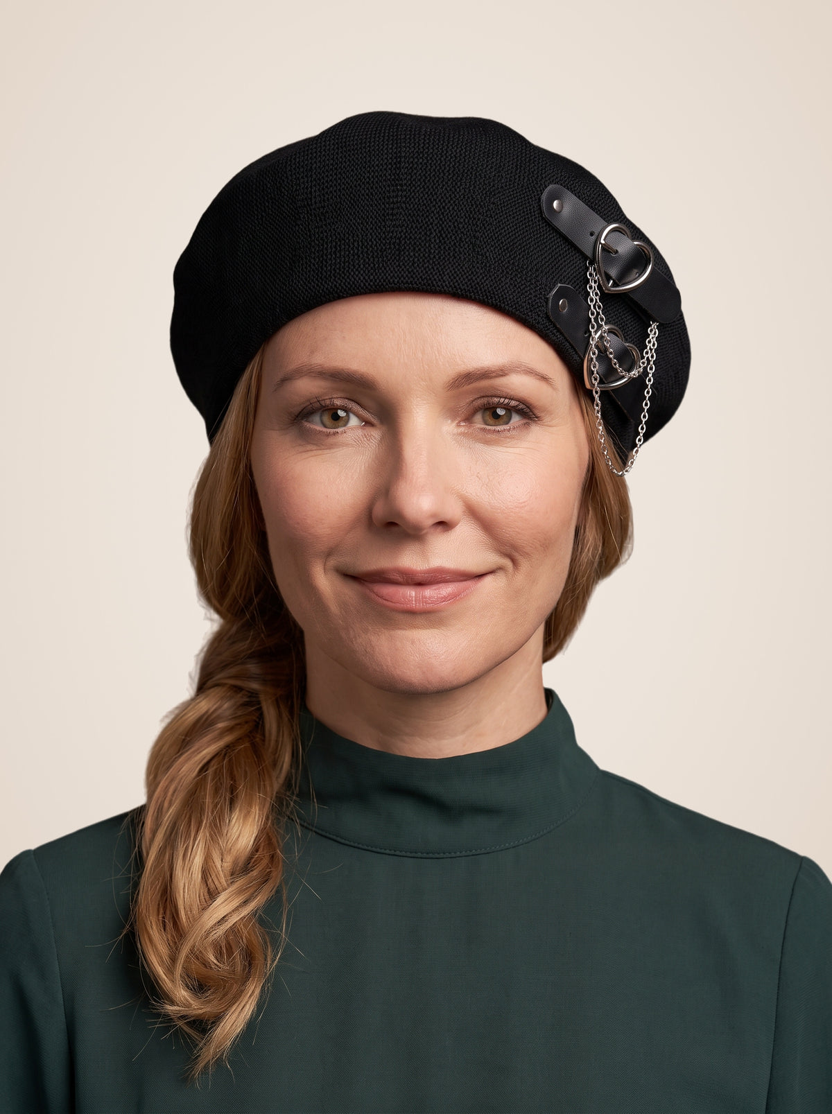 Double Heart Buckle Chain Beret in Black, worn by a model, front view